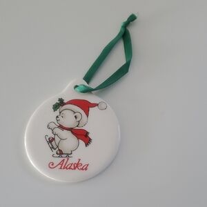 Alaska White Polar Bear Skate Ceramic Holiday Ornament with Green Ribbon
